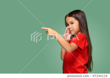 Young girl in red t-shirt is afraid of something 97244124