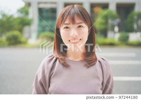 A woman smiling facing the front A woman smiling facing the front 97244180