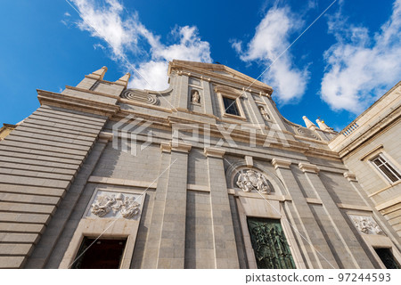 Facade of the Almudena Cathedral in Madrid Downtown - Spain 97244593