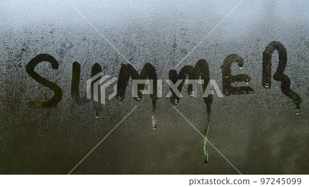 Summer inscription on the texture with condensation on the glass. Summer inscription on the texture with condensation on the glass. 97245099