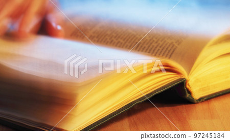 A man reading a book 97245184