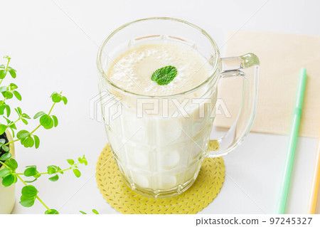 Soy milk banana smoothie at the dining table 97245327