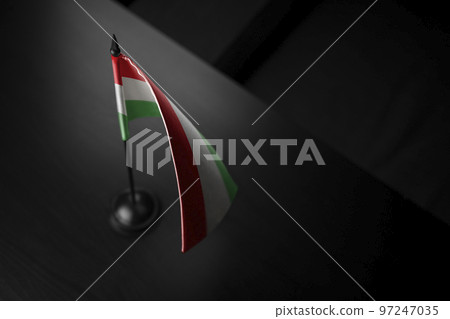 Small national flag of the Hungary on a black background Small national flag of the Hungary on a black background 97247035