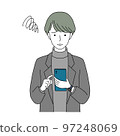 A young man operating a smartphone with a troubled face 97248069