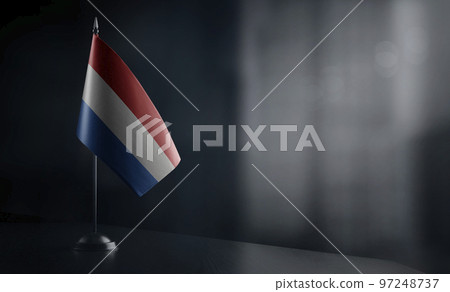 Small national flag of the Netherlands on a black background Small national flag of the Netherlands on a black background 97248737