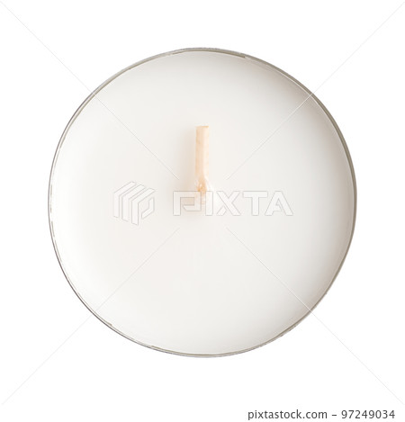 Maxi tealight, longer-burning tea light, a large tea candle, also known as nightlight, isolated from above. Tea lite, t-lite or t-candle in thin metal cup, so the wax can liquefy completely while lit. 97249034