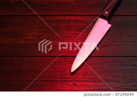 dark background and kitchen knife 97249044