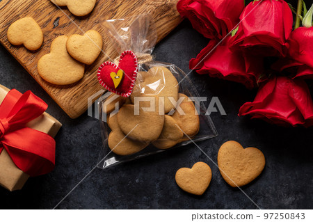 Valentines day card with cookies and rose flowers Valentines day card with cookies and rose flowers 97250843