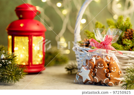 Christmas gingerbread cookies and garland lights Christmas gingerbread cookies and garland lights 97250925