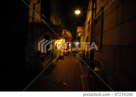Food shop in a small alley Dark and mysterious 97254106