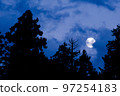 Full moon rising over the forest 3 97254183