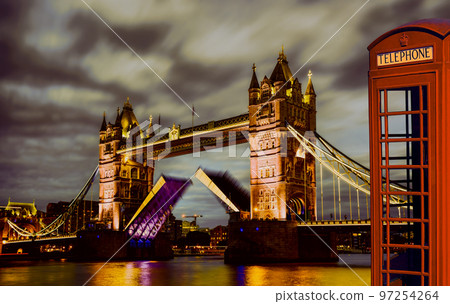 Famous Tower Bridge against red phone booth in London, England, UK 97254264