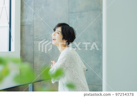 A woman with short hair A woman with short hair 97254378