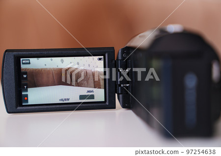 Black compact video camera monitor for home use. 97254638