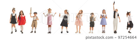 Collage. Cute little children, boys and girls in stylish retro clothes posing isolated over white background Collage. Cute little children, boys and girls in stylish retro clothes posing isolated over white background 97254664
