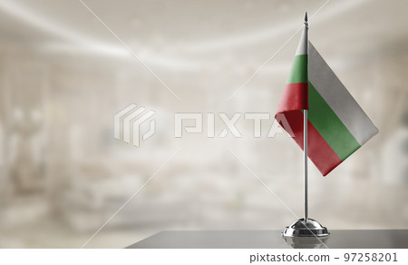 A small Bulgaria flag on an abstract blurry background 97258201