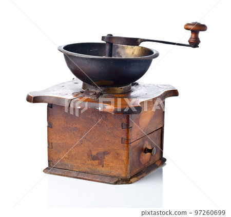 old coffee grinder isolated on white background old coffee grinder isolated on white background 97260699