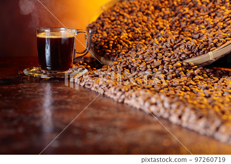 Espresso coffee cup with coffee beans. Espresso coffee cup with coffee beans. 97260719