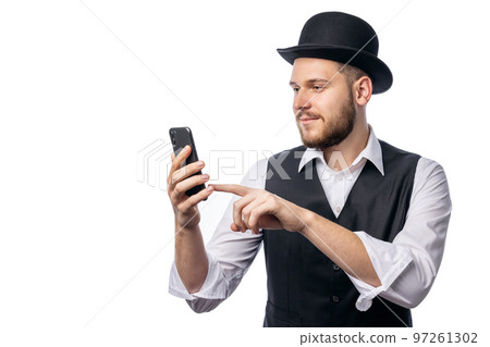 Man in hat with smartphone Man in hat with smartphone 97261302
