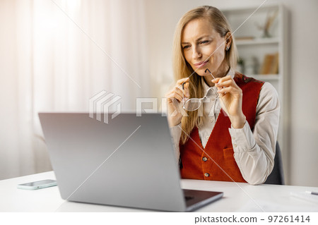 Attractive lady freelancer at home 97261414