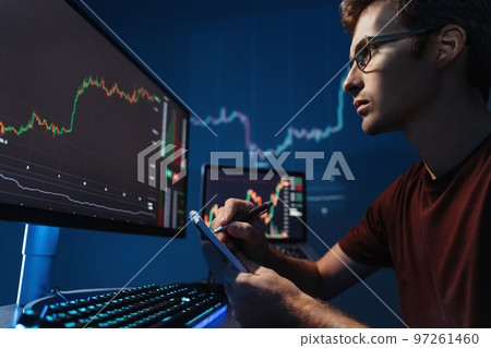 Intelligent crypto trader inventing successful trading strategy, reading candlestick chart 97261460