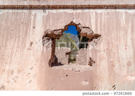 a house made of clay and red bricks in the countryside of Aregenina in the Andes mountains a house made of clay and red bricks in the countryside of Aregenina in the Andes mountains 97261660