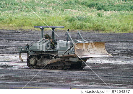 Ground Self-Defense Force bulldozer during ground leveling work 97264277