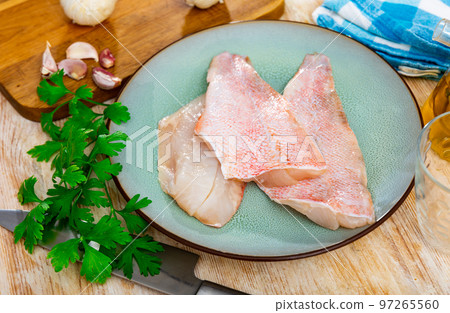Fresh raw fillet of sea bass Fresh raw fillet of sea bass 97265560