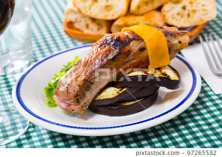 Baked pork rib with cheese and eggplant 97265582