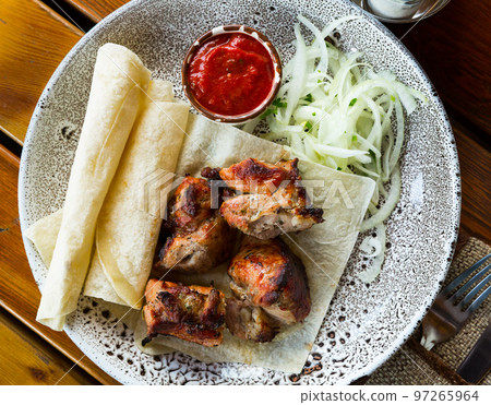 Oriental grilled pork meat shashlik 97265964