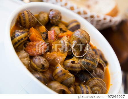 Homemade stewed escargots with chorizo 97266027
