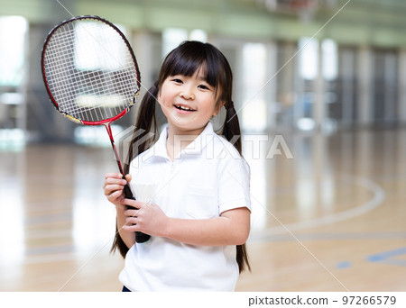 Children enjoying badminton 97266579