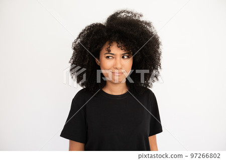 Confused woman showing doubt 97266802