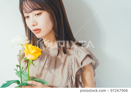 A woman with flowers 97267906