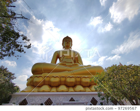 Golden big Buddha statue (Phra Buddha Dhammakaya Thep Mongkol) in Wat Pak Nam Phasi Charoen temple. 97269567