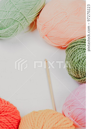 Knitting. Knitting warm clothes on your own. Tangles of wool and knitted things Knitting. Knitting warm clothes on your own. Tangles of wool and knitted things 97270223