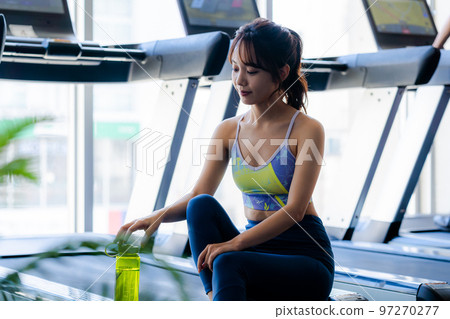 Young woman training in a sports gym 97270277