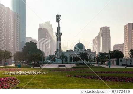 Abu Dhabi Skyline from Corniche. Abu Dhabi, Modern Skyscrapers and Landmark. Promenade in Abu Dhabi. United Arab Emirates, Middle East.  97272429