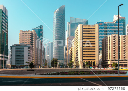 Streets and Skyscrapers. Tall Modern Glass Buildings in Abu Dhabi. United Arab Emirates. Streets and Skyscrapers. Tall Modern Glass Buildings in Abu Dhabi. United Arab Emirates. 97272568