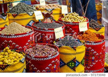 Nuts and Spices in the Old Souq of Nizwa, Oman. Traditional Bazaar with Ingredients of Omani Cuisine. Nuts and Spices in the Old Souq of Nizwa, Oman. Traditional Bazaar with Ingredients of Omani Cuisine. 97273040