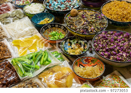Nuts and Spices in the Old Souq of Nizwa, Oman. Traditional Bazaar with Ingredients of Omani Cuisine. Nuts and Spices in the Old Souq of Nizwa, Oman. Traditional Bazaar with Ingredients of Omani Cuisine. 97273053
