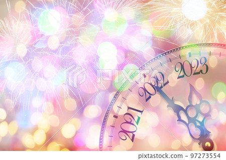 clock face on a Christmas background. the year 2023 is coming soon. the concept of the new year. clock face on a Christmas background. the year 2023 is coming soon. the concept of the new year. 97273554