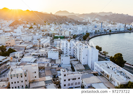 Mutrah Sunset. Cityscape View of Muscat at Beautiful Sunset. The Capital of Oman. Arabian Peninsula. 97273722