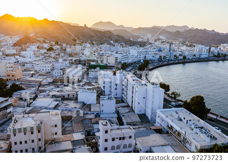 Mutrah Sunset. Cityscape View of Muscat at Beautiful Sunset. The Capital of Oman. Arabian Peninsula. 97273723
