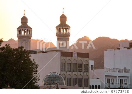 Mutrah Sunset. Cityscape View of Muscat at Beautiful Sunset. The Capital of Oman. Arabian Peninsula. Mutrah Sunset. Cityscape View of Muscat at Beautiful Sunset. The Capital of Oman. Arabian Peninsula. 97273738