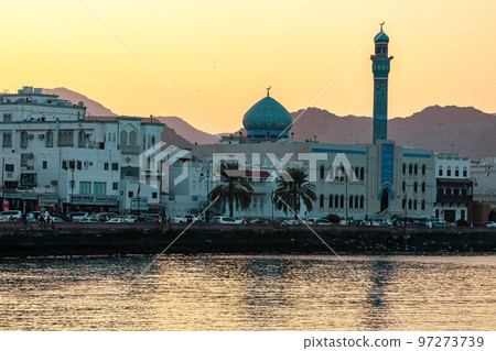 Mutrah Sunset. Cityscape View of Muscat at Beautiful Sunset. The Capital of Oman. Arabian Peninsula. 97273739