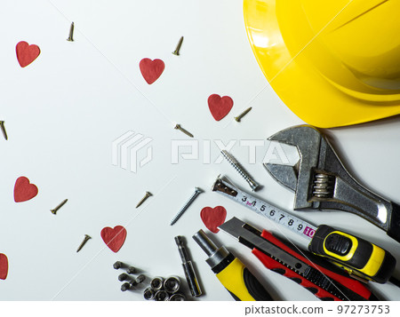 Construction tools, hard hat on white background with copy space Construction tools, hard hat on white background with copy space 97273753