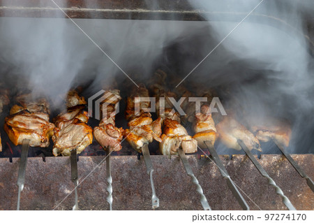 Cooking tasty barbecue in a brazier 97274170