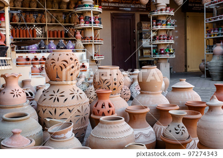 Hand Made Pottery in Nizwa Market. Clay Jars at the Rural Traditional Arabic Bazaar, Oman.  97274343