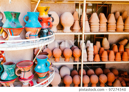 Hand Made Pottery in Nizwa Market. Clay Jars at the Rural Traditional Arabic Bazaar, Oman.  97274348